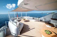 Luxurious ISA Custom yacht deck with seating, ocean view, and modern design, 2012 model.