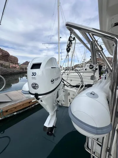 Seascape Yacht Photos Pics 2012 Leopard 39 yacht with Tohatsu 30 outboard motor at marina.