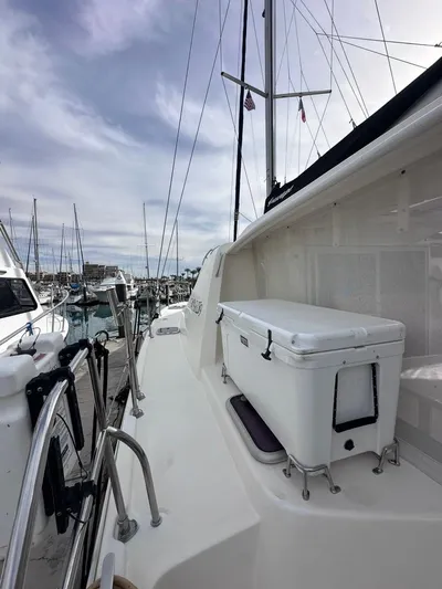 Seascape Yacht Photos Pics 2012 Leopard 39 yacht docked at marina, featuring deck and cooler.