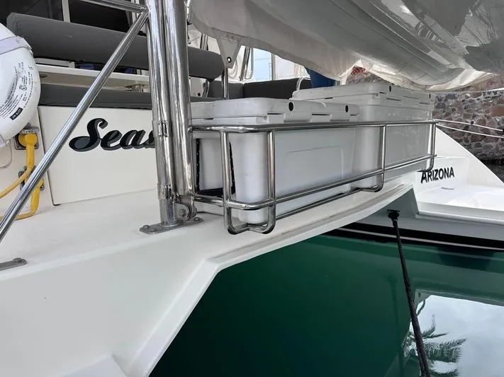 Seascape Yacht Photos Pics Leopard 39 sailboat, 2012 model, with storage rack and calm water reflection.