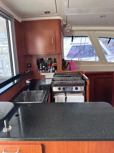 Seascape Yacht Photos Pics Leopard 39 yacht kitchen interior with stove, sink, and storage, 2012 model.