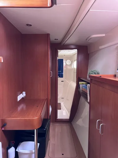 Seascape Yacht Photos Pics Interior of a 2012 Leopard 39 yacht with wooden cabinetry and modern design.
