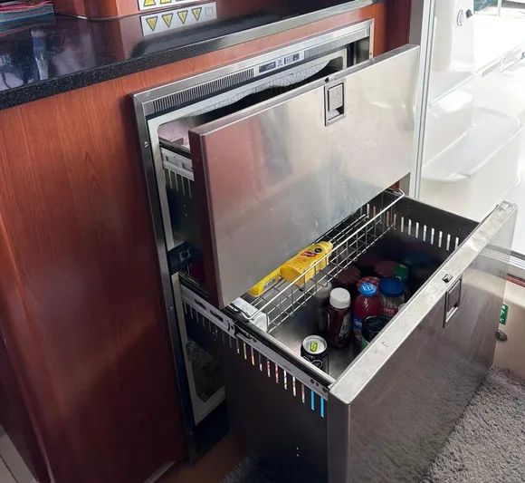Seascape Yacht Photos Pics Stainless steel drawer fridge on Leopard 39 yacht, 2012 model, with beverages and condiments.