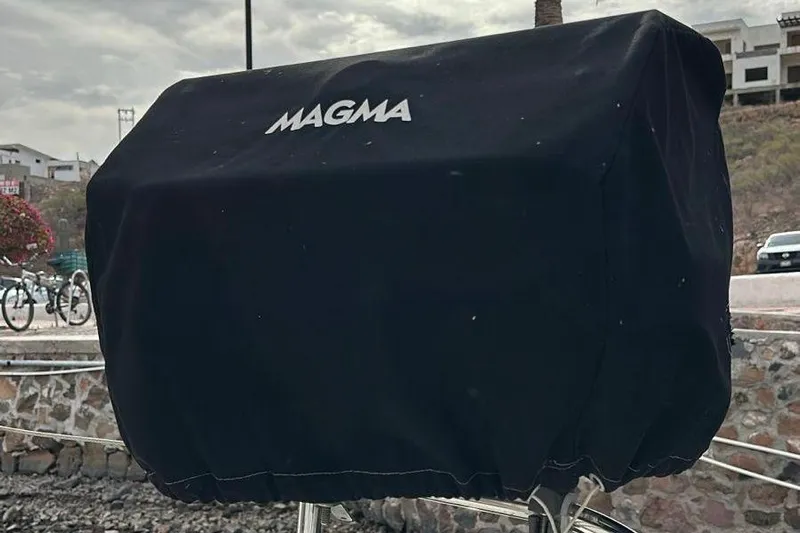 Seascape Yacht Photos Pics Black Magma grill cover on Leopard 39 yacht, 2012 model, dockside view.