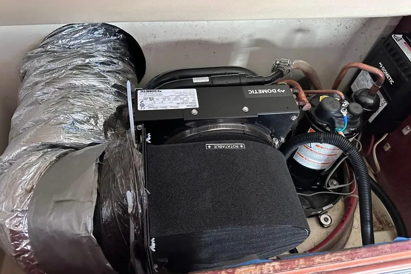 Seascape Yacht Photos Pics Leopard 39 (2012) engine compartment with Dometic equipment and ductwork.