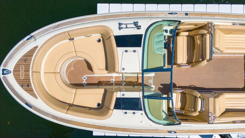 Levi Yacht Photos Pics 2013 Chris-Craft Launch 32 boat, aerial view, showcasing luxurious seating and elegant design.