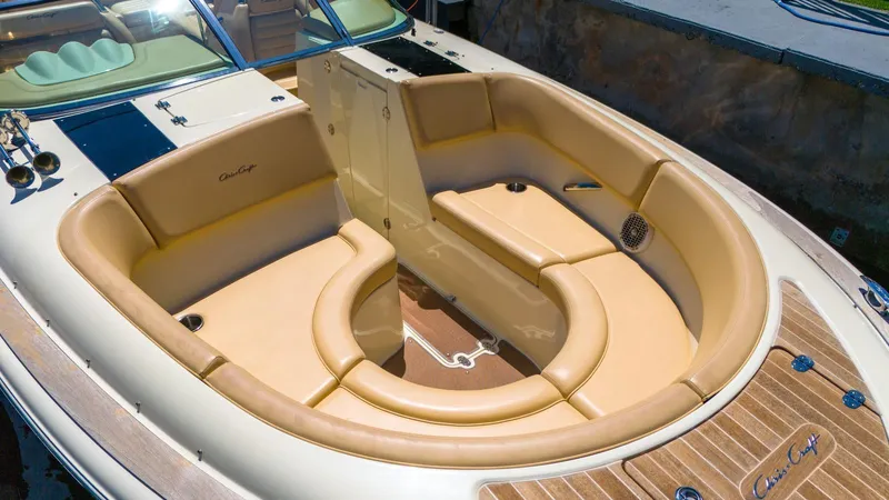 Levi Yacht Photos Pics 2013 Chris-Craft Launch 32 boat with luxurious tan seating and elegant wood accents.