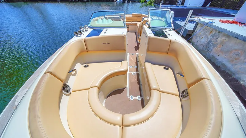 Levi Yacht Photos Pics 2013 Chris-Craft Launch 32 boat with spacious seating and elegant design on the water.