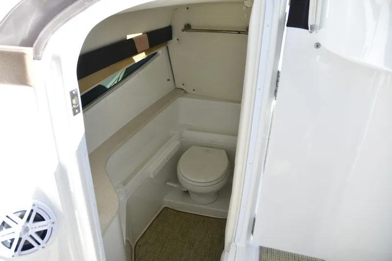  Yacht Photos Pics Interior of 2016 Cobalt 336 boat bathroom with toilet and window.