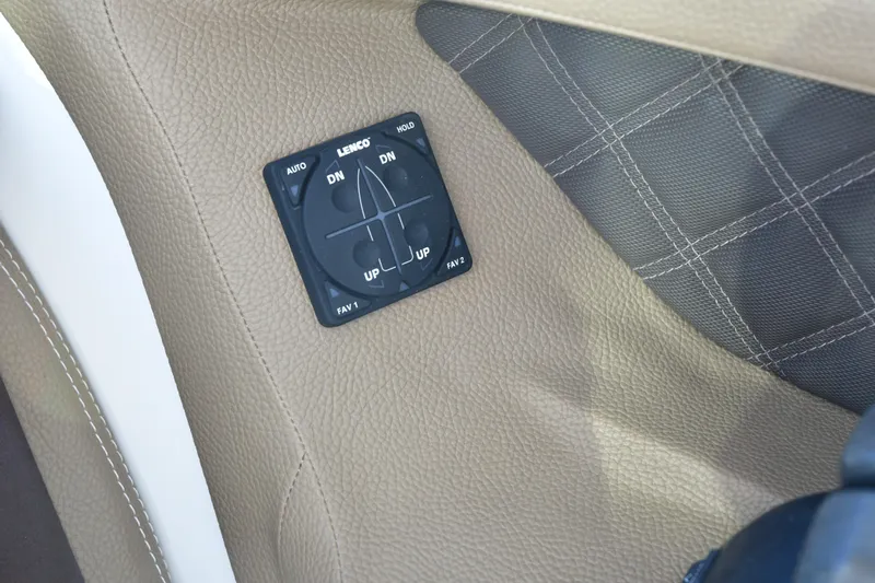  Yacht Photos Pics 2016 Cobalt 336 interior with Lenco control panel on beige leather.