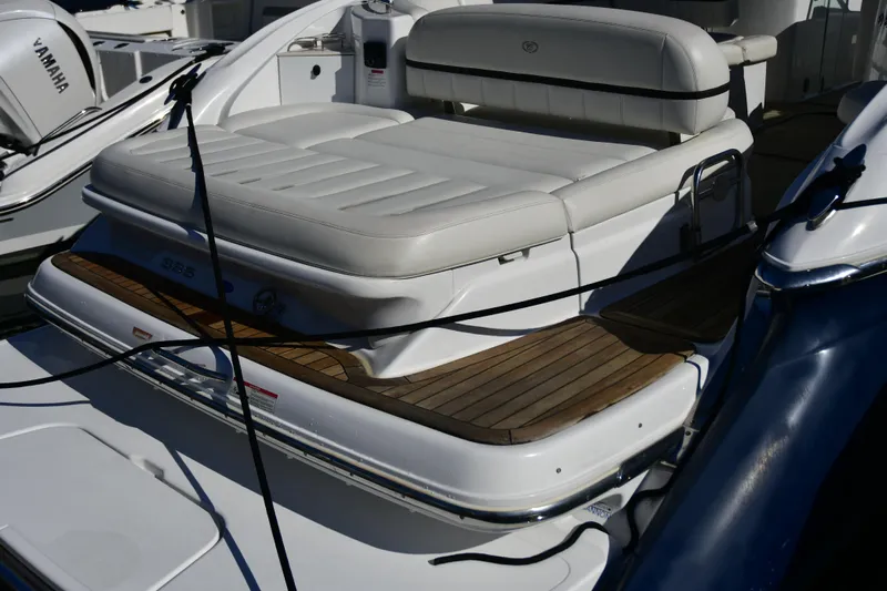  Yacht Photos Pics 2016 Cobalt 336 boat with white seating and wooden deck details.