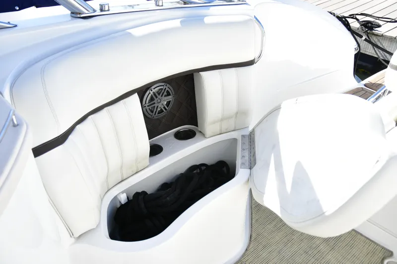  Yacht Photos Pics 2016 Cobalt 336 boat interior with white seating and storage compartment.