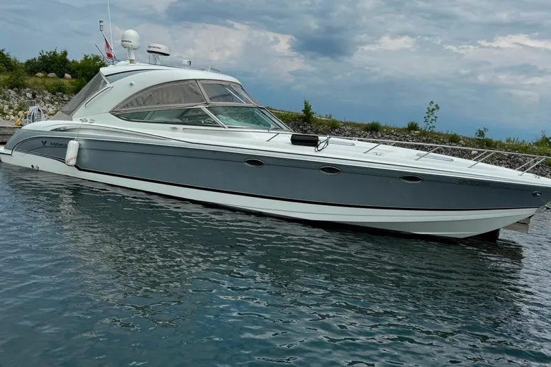 Silver Lining Yacht Photos Pics 2008 Formula 400 Super Sport boat on calm water under cloudy sky.