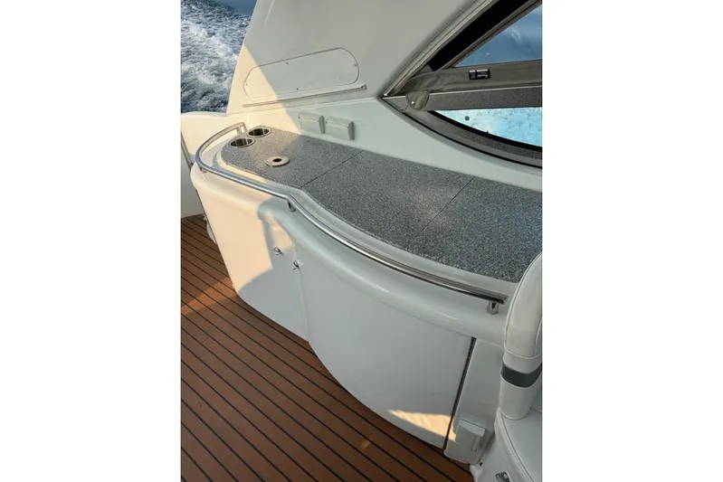 Silver Lining Yacht Photos Pics 2008 Formula 400 Super Sport yacht interior with sleek countertop and wooden flooring.