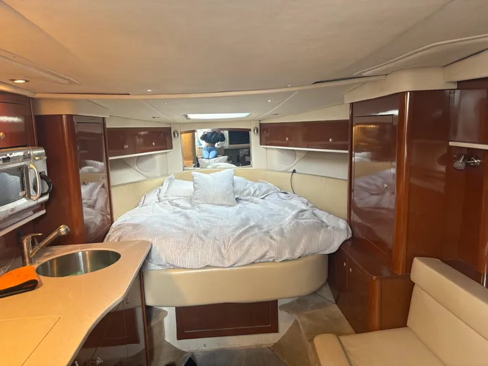  Yacht Photos Pics Interior of 2008 Sea Ray 330 Sundancer with cozy bed and modern amenities.