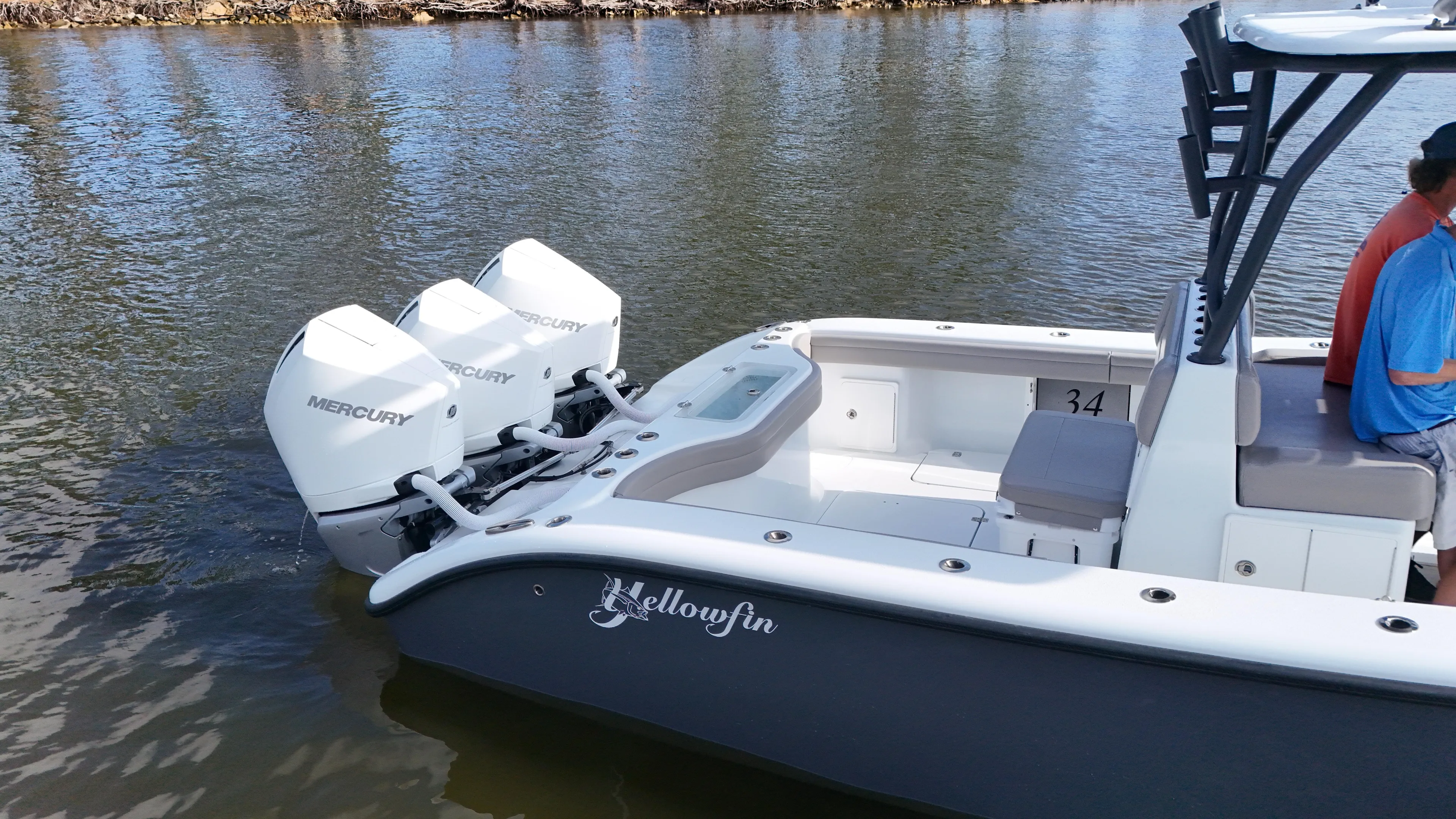 Engine Warranty X Trailer Yacht Photos Pics 2022 Yellowfin 34 boat with twin Mercury engines on calm water.