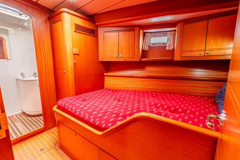 Luka Yacht Photos Pics Luxurious cabin interior of 1997 Farr 60 Pilot House yacht with wooden finish.