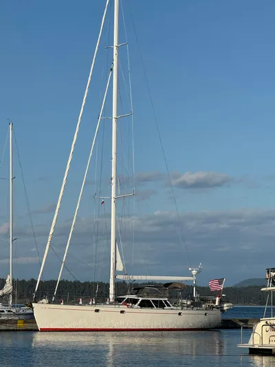 Luka Yacht Photos Pics Sailboat docked at marina, Farr 60 Pilot House, 1997 model, under clear blue sky.