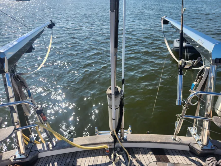 Bonnefooi Yacht Photos Pics Sailing yacht Hallberg-Rassy 62, 2008 model, deck view with ocean backdrop.