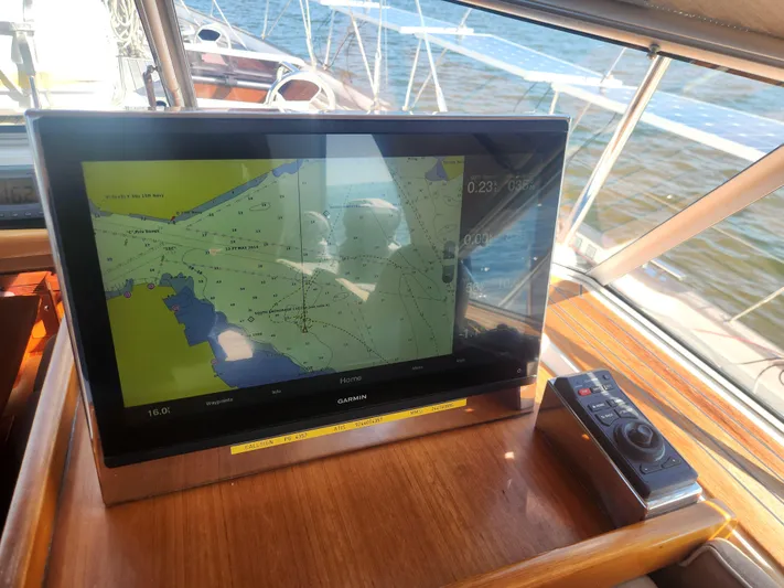 Bonnefooi Yacht Photos Pics Navigation system on 2008 Hallberg-Rassy 62 yacht, displaying nautical chart.