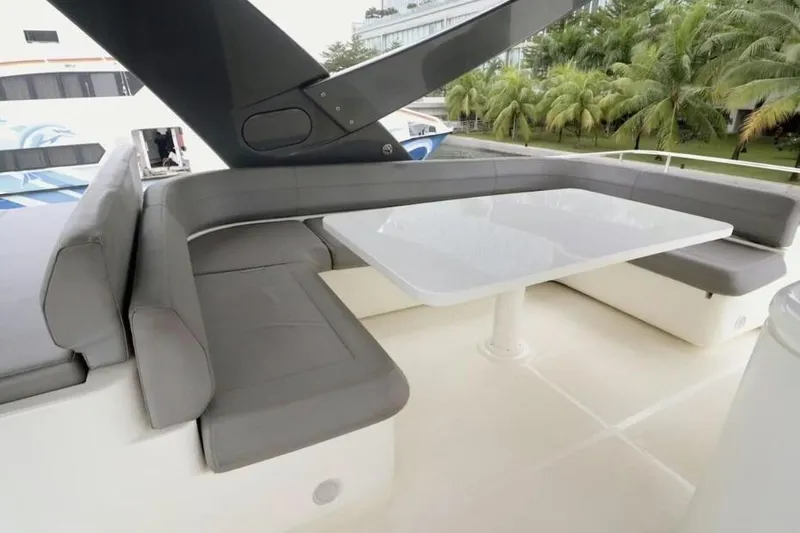  Yacht Photos Pics Luxurious seating area on 2017 Ferretti Yachts 700, featuring sleek design and comfort.