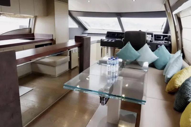  Yacht Photos Pics Luxurious interior of 2017 Ferretti Yachts 700 with modern seating and glass table.