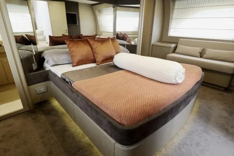  Yacht Photos Pics Luxurious bedroom interior of 2017 Ferretti Yachts 700 with elegant bedding and modern design.