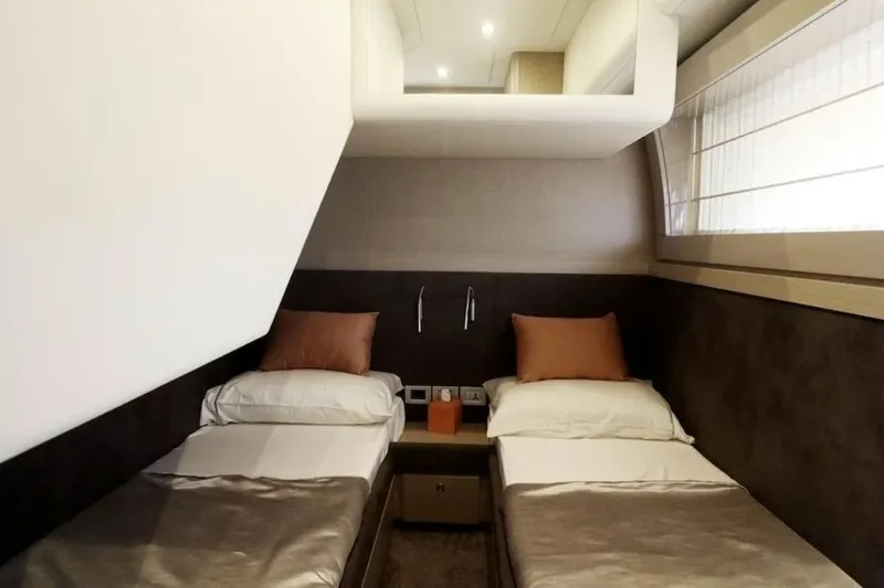  Yacht Photos Pics Luxurious twin cabin interior of 2017 Ferretti Yachts 700 with modern design.