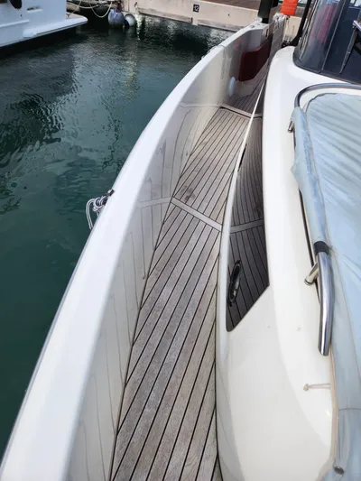  Yacht Photos Pics 2022 Cranchi A46 Luxury Tender with sleek deck design at marina.