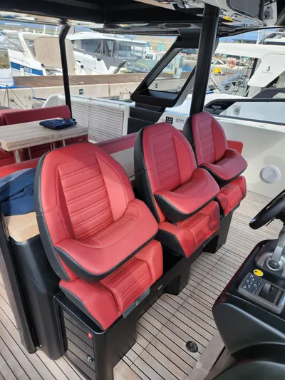  Yacht Photos Pics Red leather seats on 2022 Cranchi A46 Luxury Tender yacht interior.