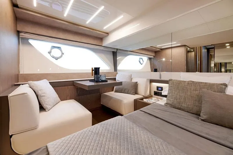  Yacht Photos Pics Luxurious interior of 2022 Ferretti Yachts 550, featuring elegant seating and modern design.