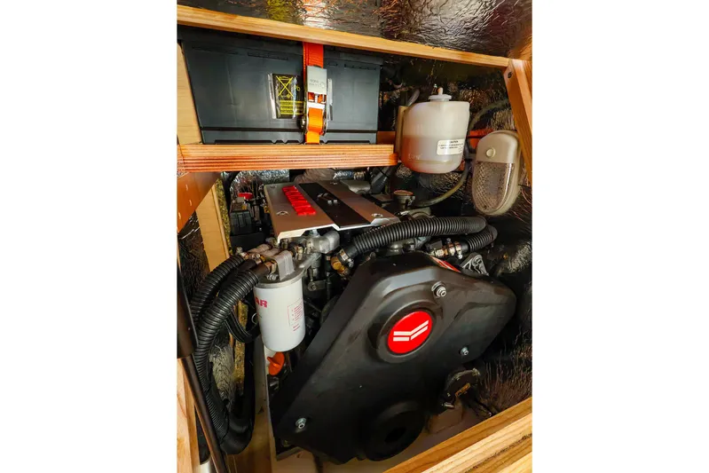  Yacht Photos Pics Engine compartment of a 2022 Hanse 388 yacht, showcasing detailed components and wiring.
