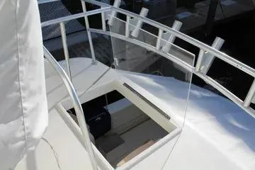 Island Dancer Yacht Photos Pics 1996 Ocean 53 Super Sport yacht deck with open hatch and railing.