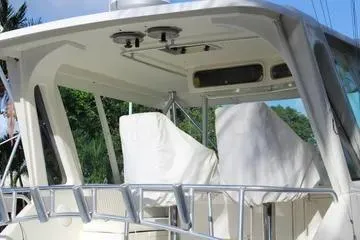 Island Dancer Yacht Photos Pics 1996 Ocean 53 Super Sport yacht with covered seating and sleek design.