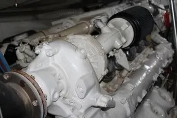 Island Dancer Yacht Photos Pics Engine of a 1996 Ocean 53 Super Sport boat, showcasing mechanical components.