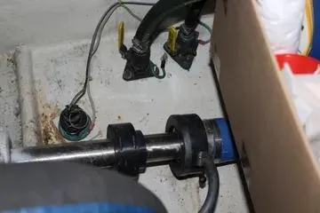 Island Dancer Yacht Photos Pics 1996 Ocean 53 Super Sport engine compartment with mechanical components and wiring.