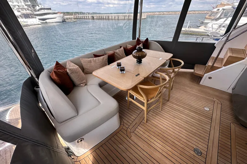  Yacht Photos Pics Luxurious 2022 Princess Y72 yacht interior with elegant seating and dining area.
