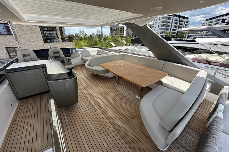  Yacht Photos Pics Luxurious 2022 Princess Y72 yacht deck with elegant seating and modern amenities.