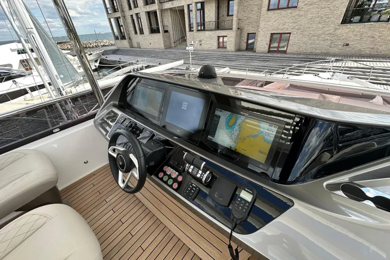  Yacht Photos Pics Luxurious 2022 Princess Y72 yacht helm with advanced navigation displays and controls.