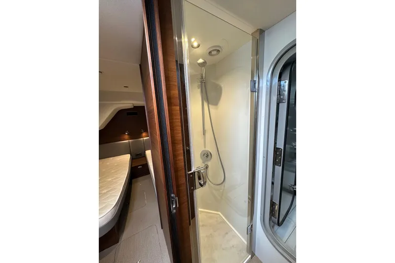  Yacht Photos Pics Luxurious bathroom interior of 2022 Princess Y72 yacht with modern shower design.