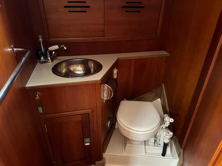 Elusive Yacht Photos Pics Hinckley Sou'wester 42 yacht bathroom with sink and marine toilet, 1987 model.