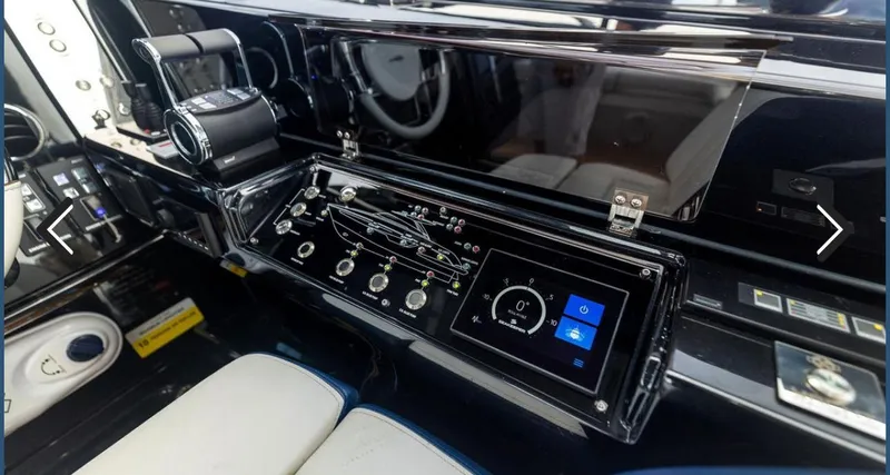  Yacht Photos Pics 2023 Riva Rivale 56 Hard Top yacht dashboard with modern controls and navigation system.