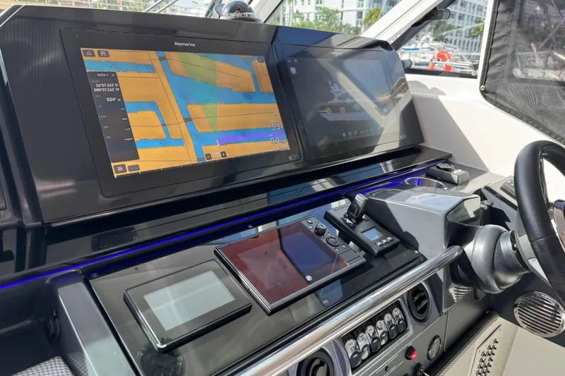 Formula Yacht Photos Pics Dashboard of 2023 Formula 400 Super Sport Crossover with navigation screens and controls.