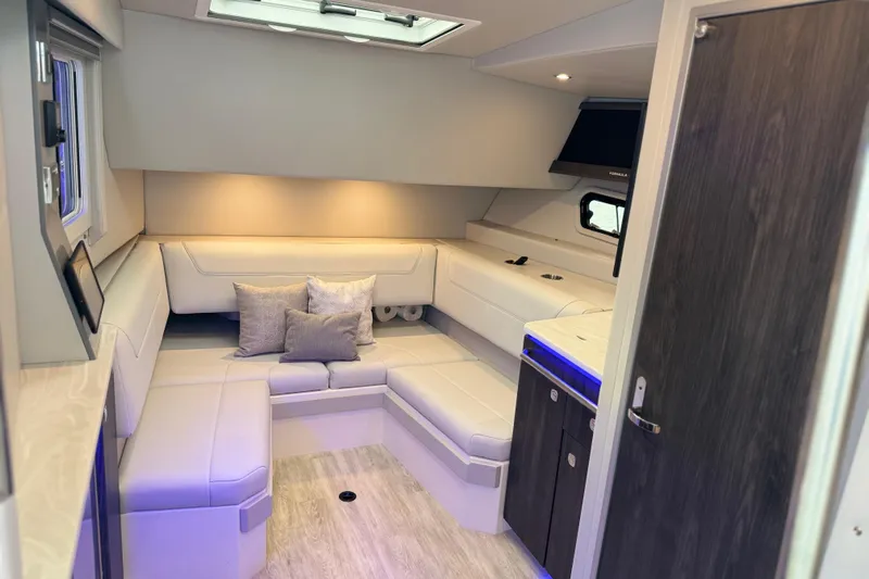 Formula Yacht Photos Pics Luxurious interior of 2023 Formula 400 Super Sport Crossover with modern seating and ambient lighting.