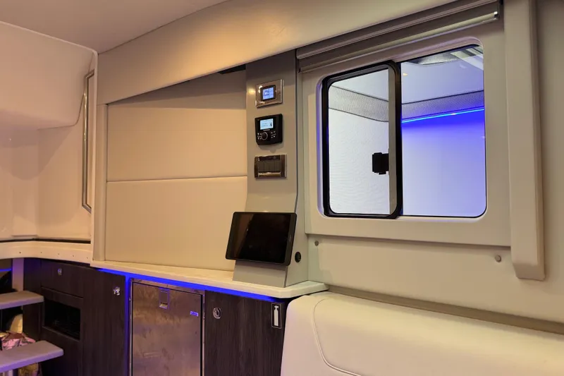 Formula Yacht Photos Pics Interior of 2023 Formula 400 Super Sport Crossover with modern controls and ambient lighting.