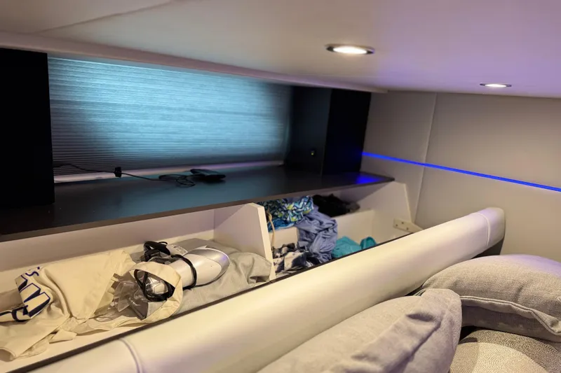 Formula Yacht Photos Pics 2023 Formula 400 Super Sport Crossover interior with modern storage and ambient lighting.
