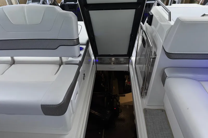 Formula Yacht Photos Pics 2023 Formula 400 Super Sport Crossover interior seating and access hatch.