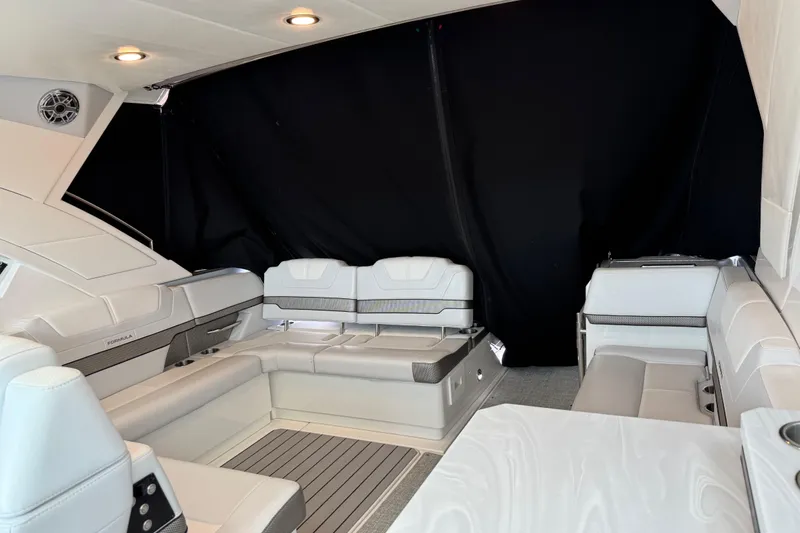Formula Yacht Photos Pics Luxurious interior of 2023 Formula 400 Super Sport Crossover boat with elegant seating.