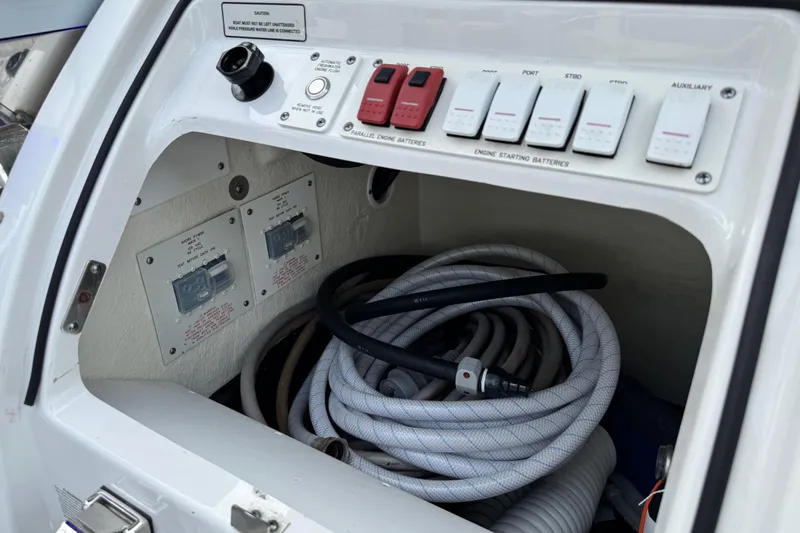 Formula Yacht Photos Pics Control panel and storage compartment on 2023 Formula 400 Super Sport Crossover boat.