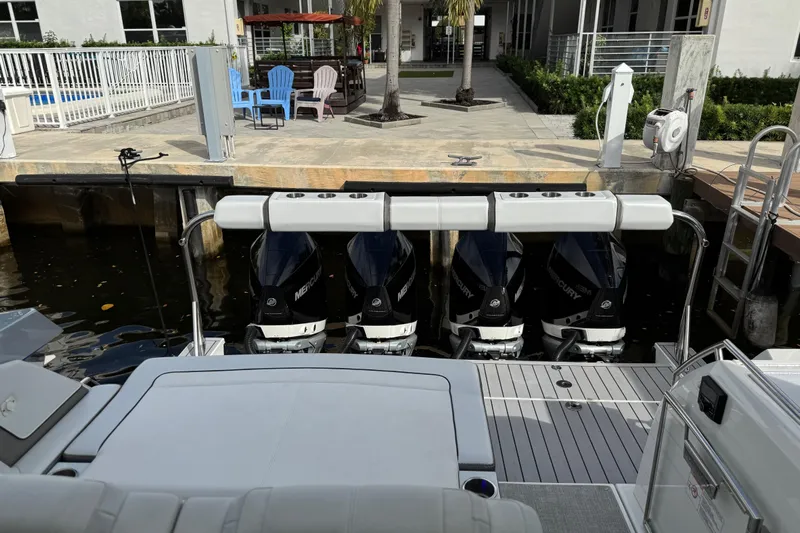 Formula Yacht Photos Pics 2023 Formula 400 Super Sport Crossover with four Mercury outboard engines docked.